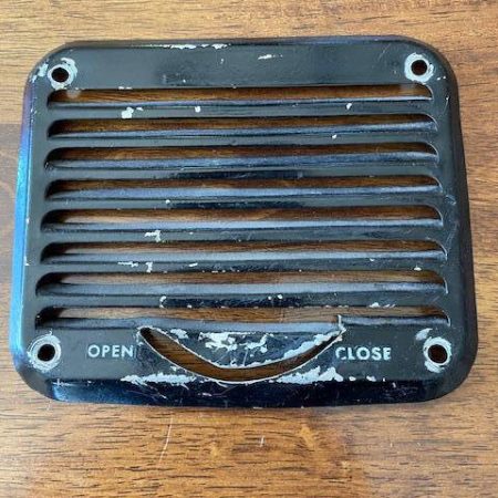 Cessna 310K LEFT Ankle Vent Grill.  Used.  Broken.