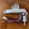 Whelen A600-PR Wing Tip Strobe & Nav Light Assembly. Red. New Old Stock - part number A600-PR-14V (view 1)