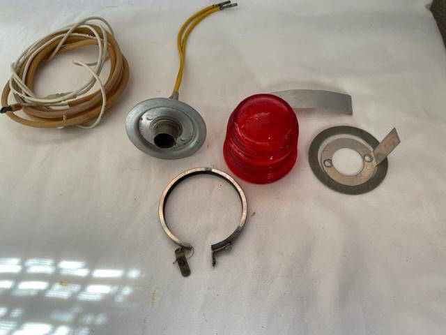 Cessna 210K 12 Volt Red Glass Strobe Beacon Light Assembly. Used - part number C621001-0103