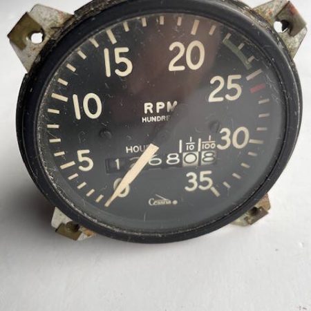 Cessna 182E Tachometer With Tachometer Drive Cable.  Used.