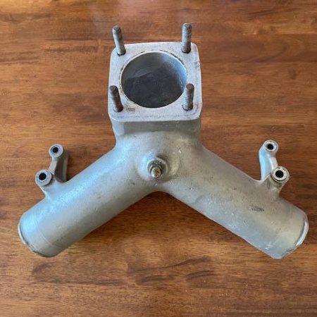 Continental O-470R/S/U Carburetor Manifold Riser.  Used.