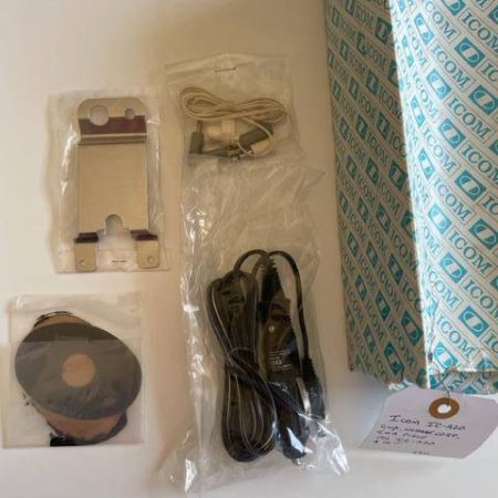 Icom IC-A20 Clip, Charger, Ear Piece Kit.  New Old Stock.