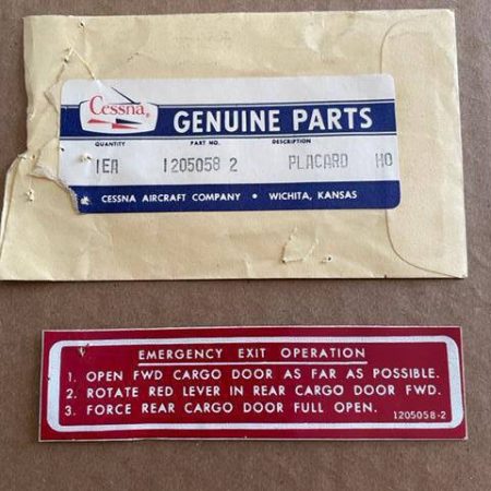 Cessna 205, 206, 207 Cargo Door Emergency Exit Placard. New Old Stock - part number 1205058-2