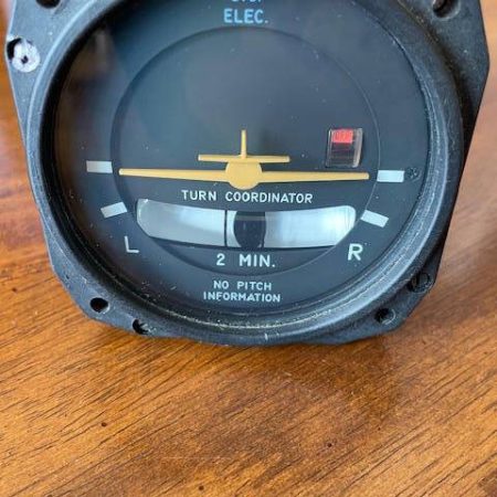Mid-Continent/Electric Gyro Corp Turn Coordinator. 12-32 VDC. Used - part number 1394T100-7Z