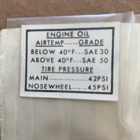 Cessna 210 Map Compartment Engine Oil And Tire Pressure Decal. New Old Stock